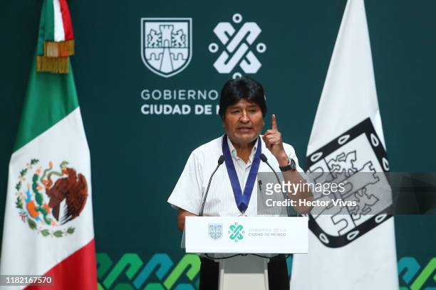 Former president of Bolivia Evo Morales speaks during an event to distinguish him as honorary guest at City Hall on November 13, 2019 in Mexico City,...