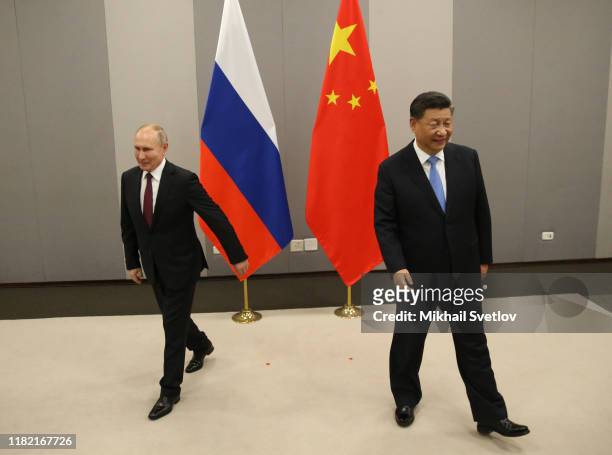 Russian President Vladimir Putin and Chinese President Xi Jinping seen during their bilateral meeting on November 13, 2019 in Brasilia, Brazil. The...