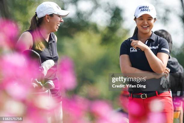 Kristen Gillman of USA communicates with Kim Sei Young of South Korea during Final Round of 2019 Buick LPGA Shanghai at Shanghai Qizhong Garden Golf...