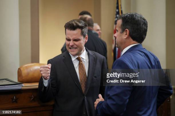 Rep. Matt Gaetz speaks top Rep. John Ratcliffe at the conclusion of testimony from top U.S. Diplomat in Ukraine William B. Taylor and Deputy...