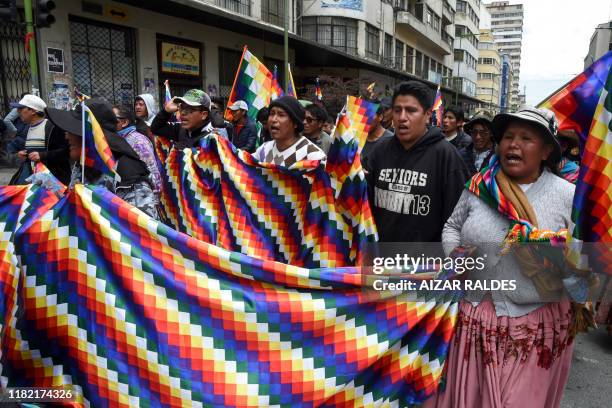 Supporters of Bolivian ex-President Evo Morales and locals discontented with the political situation march during a protest from El Alto to La Paz on...