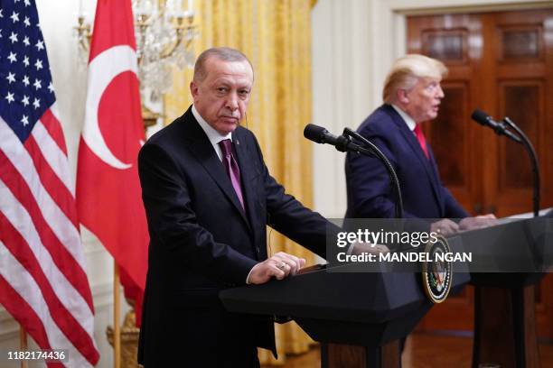 President Donald Trump and Turkey's President Recep Tayyip Erdogan take part in a joint press conference in the East Room of the White House in...