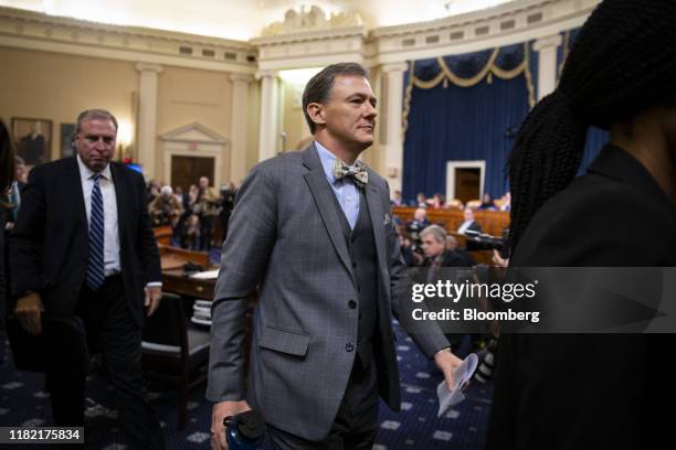 George Kent, deputy assistant U.S. Secretary of state, departs after testifying during a House Intelligence Committee impeachment inquiry hearing in...