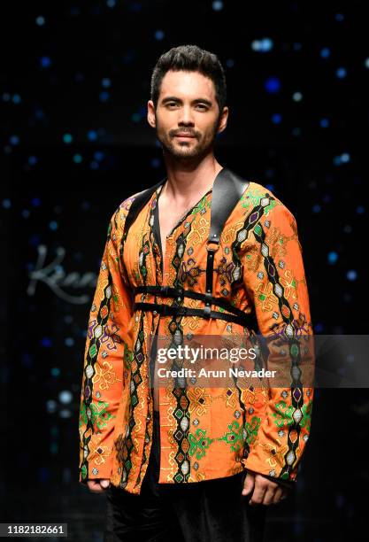 Model walks the runway wearing Kenneth Barlis during Los Angeles Fashion Week SS/20 Powered by Art Hearts Fashion on October 19, 2019 in Los Angeles,...