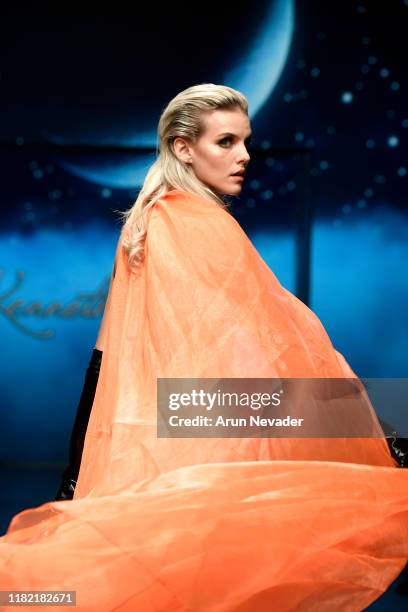 Model walks the runway wearing Kenneth Barlis during Los Angeles Fashion Week SS/20 Powered by Art Hearts Fashion on October 19, 2019 in Los Angeles,...