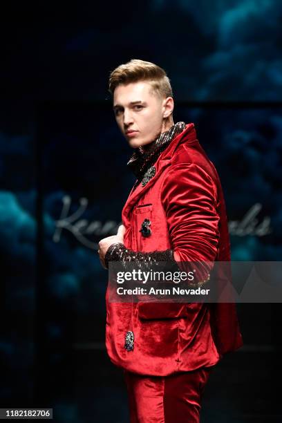 Model walks the runway wearing Kenneth Barlis during Los Angeles Fashion Week SS/20 Powered by Art Hearts Fashion on October 19, 2019 in Los Angeles,...