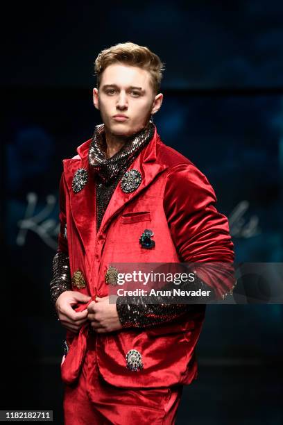 Model walks the runway wearing Kenneth Barlis during Los Angeles Fashion Week SS/20 Powered by Art Hearts Fashion on October 19, 2019 in Los Angeles,...