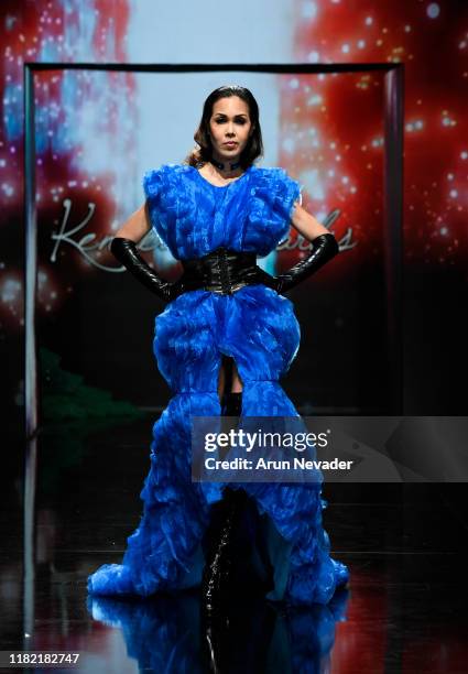 Model walks the runway wearing Kenneth Barlis during Los Angeles Fashion Week SS/20 Powered by Art Hearts Fashion on October 19, 2019 in Los Angeles,...