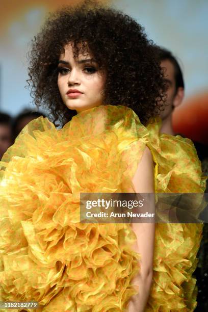 Model walks the runway wearing Kenneth Barlis during Los Angeles Fashion Week SS/20 Powered by Art Hearts Fashion on October 19, 2019 in Los Angeles,...