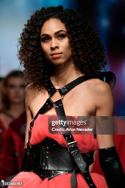 Model walks the runway wearing Kenneth Barlis during Los Angeles Fashion Week SS/20 Powered by Art Hearts Fashion on October 19, 2019 in Los Angeles,...