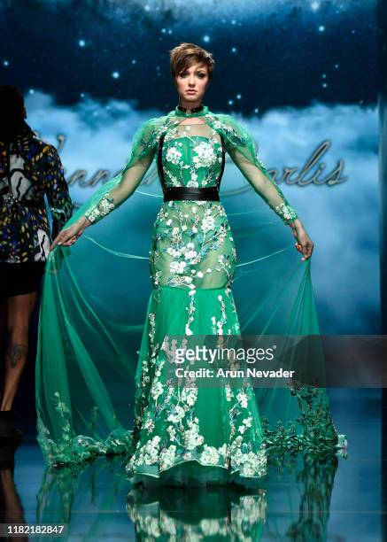 Nichole Kennedy walks the runway wearing Kenneth Barlis during Los Angeles Fashion Week SS/20 Powered by Art Hearts Fashion on October 19, 2019 in...