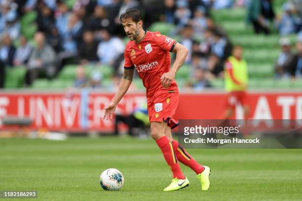 Vince Lia of Adelaide United runs with the ball during the round two A-League match between Melbourne City and Adelaide United at AAMI Park on...