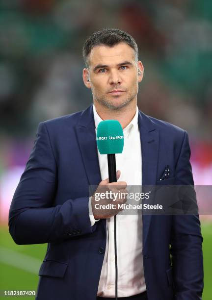 Mike Phillips is seen working as a TV pundit prior to the Rugby World Cup 2019 Quarter Final match between Wales and France at Oita Stadium on...