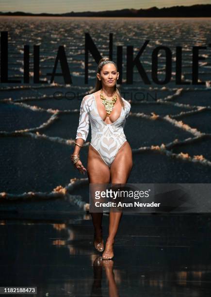 Rocsi Diaz walks the runway wearing Lila Nikole during Los Angeles Fashion Week SS/20 Powered by Art Hearts Fashion on October 19, 2019 in Los...