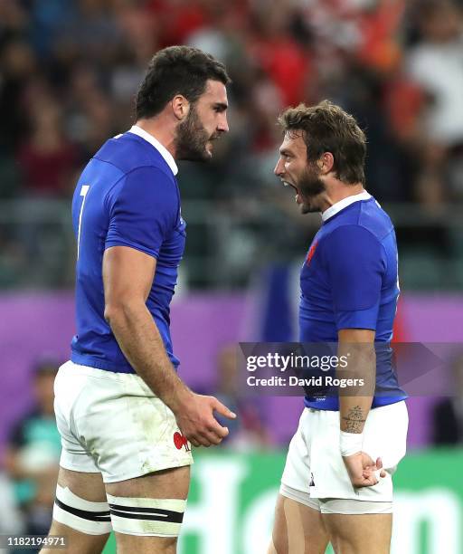 Charles Ollivon of France celebrates scoring his sides second try with Maxime Medard during the Rugby World Cup 2019 Quarter Final match between...