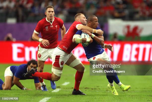 Gael Fickou of France is tackled high by Ross Moriarty of Wales which leads to Ross Moriarty receiving a yellow card during the Rugby World Cup 2019...