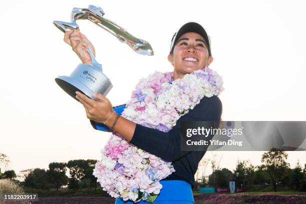 Danielle Kang of USA poses for photoshot with the trophy after winning 2019 Buick LPGA Shanghai at Shanghai Qizhong Garden Golf Club on October 20,...