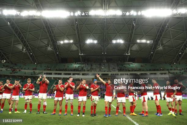 Wales players show appreciation to the fans following the Rugby World Cup 2019 Quarter Final match between Wales and France at Oita Stadium on...