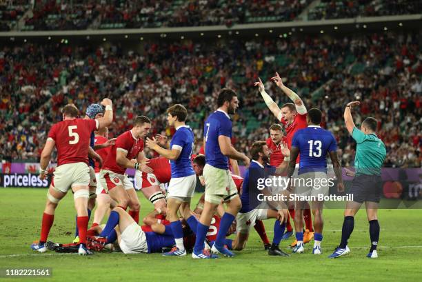 Hadleigh Parkes of Wales celebrates as Ross Moriarty of Wales scores his sides second try during the Rugby World Cup 2019 Quarter Final match between...