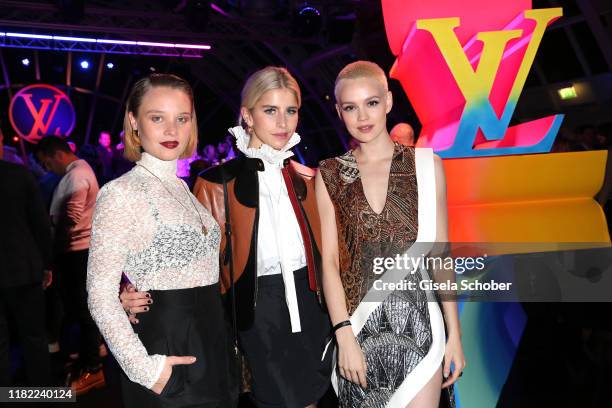 Sonja Gerhardt, Emilia Schuele and Caro Daur, dressed by Louis Vuitton, during the Louis Vuitton Store opening at KaDeWe on November 12, 2019 in...