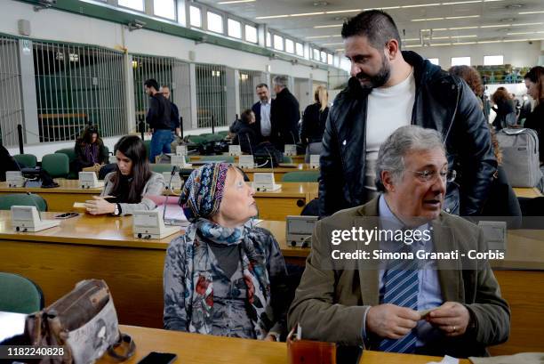 Riccardo Casamassima, The police officer who first accused his colleagues, speaks with Giovanni Cucchi and Rita Calore, Stefano's parents, in the...