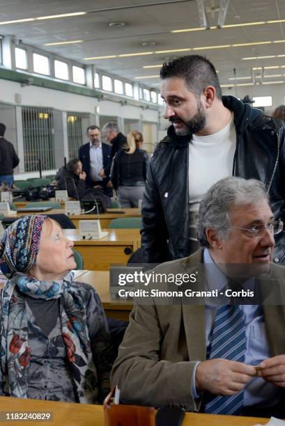 Riccardo Casamassima, The police officer who first accused his colleagues, speaks with Giovanni Cucchi and Rita Calore, Stefano's parents, in the...