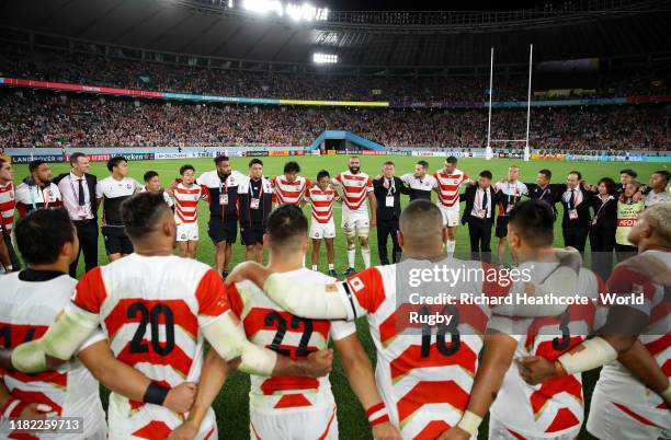 Michael Leitch of Japan talks to his team after the Rugby World Cup 2019 Quarter Final match between Japan and South Africa at the Tokyo Stadium on...