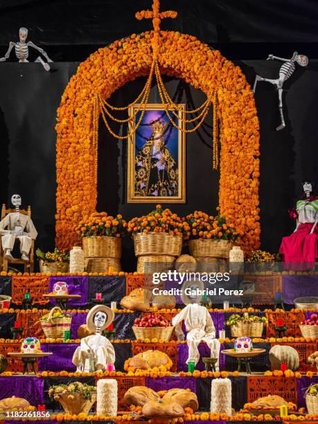 a day of the dead altar in oaxaca - religious offering stockfoto's en -beelden