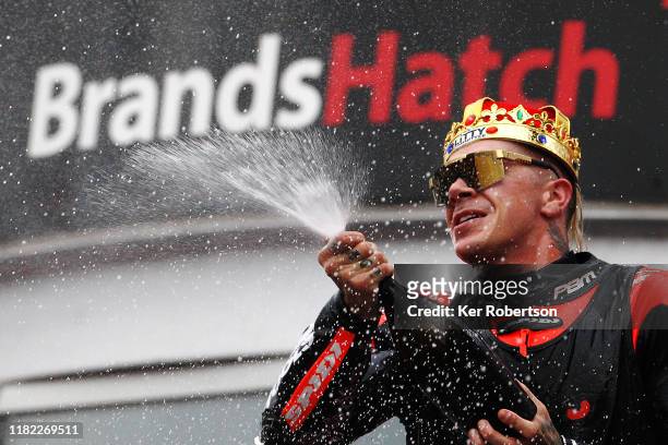 Scott Redding of Be Wiser Ducati celebrates winning the 2019 Bennetts British Superbike Championship at Brands Hatch on October 20, 2019 in...