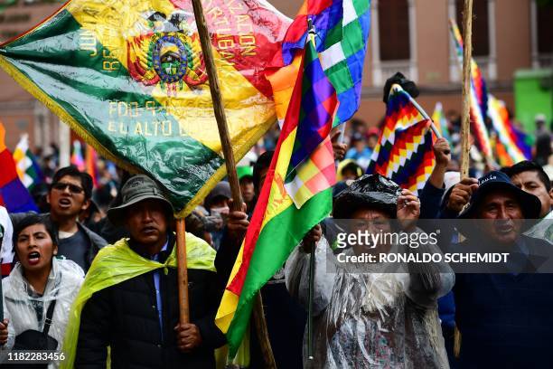 Supporters of Bolivian ex-President Evo Morales demonstrate in La Paz on November 14, 2019. - Bolivia's exiled former president Evo Morales said...