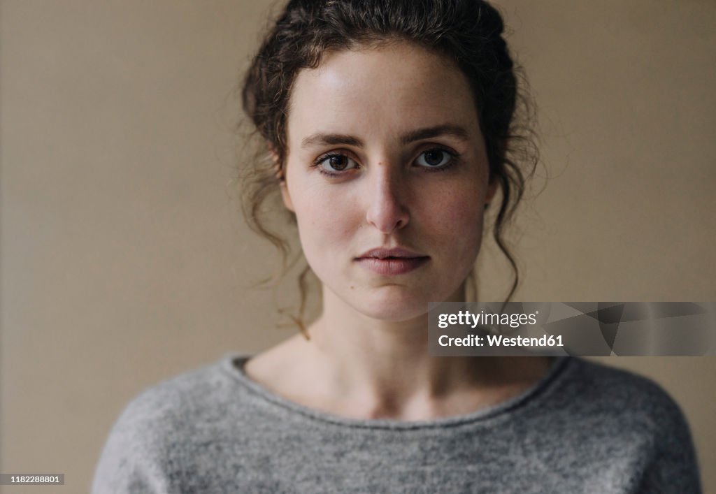 Portrait of serious young woman