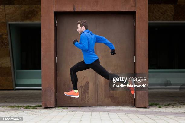 Man Rushing Out A Door Man Running Out The Door Photos and Premium High Res Pictures - Getty ...