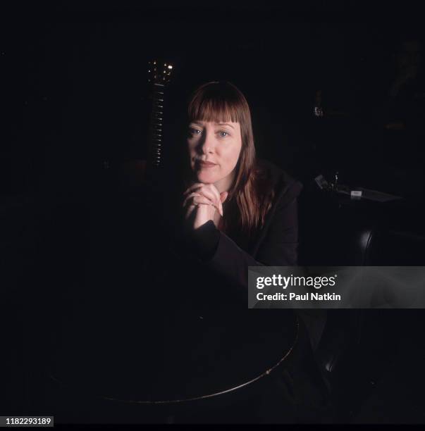 Portrait of American Folk and Pop musician Suzanne Vega as she poses backstage at the Park West, Chicago, Illinois, February 5, 2002.