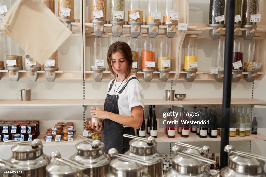 Young woman shopping in packaging-free supermarket