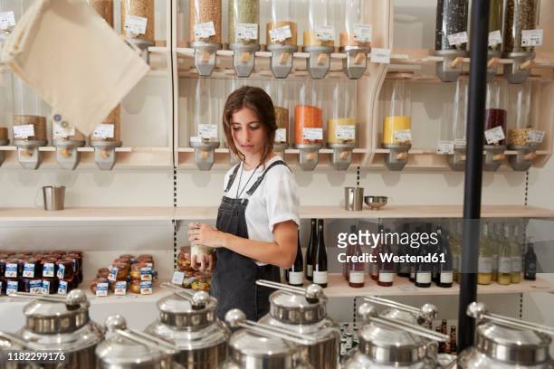 Young woman shopping in packaging-free supermarket