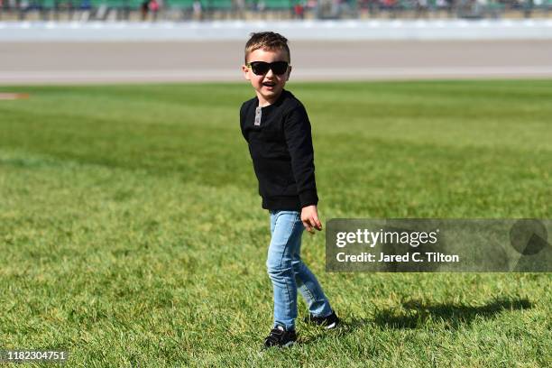 Brexton Busch, son of Kyle Busch, driver of the M&M's Halloween Toyota, plays on the infield prior to the Monster Energy NASCAR Cup Series Hollywood...