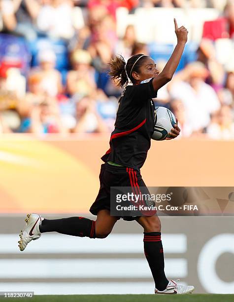 Maribel Dominguez of Mexico celebrates after scoring the second goal against New Zealand during the FIFA Women's World Cup 2011 Group B match between...