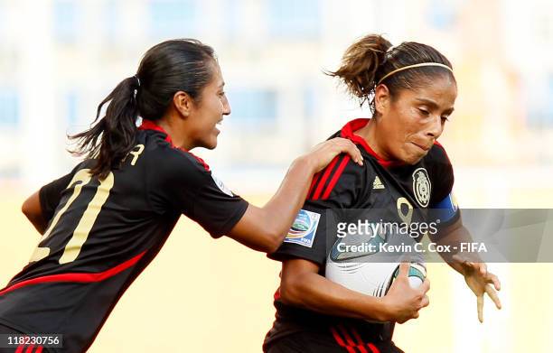 Maribel Dominguez of Mexico celebrates after scoring the second goal against New Zealand with Stephany Mayor during the FIFA Women's World Cup 2011...