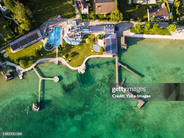 aerial view of a sheltered marina at attersee lake - attersee stock-fotos und bilder