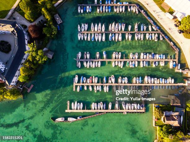 aerial view of boats moored in a marina - attersee stock-fotos und bilder