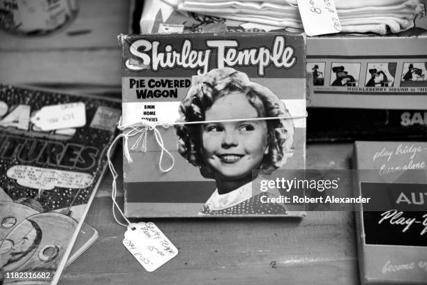 Vintage copy of a home movie featuring Shirley Temple appearing in the 1932 film 'Pie Covered Wagon' for sale at an antique shop in Newport, Oregon.