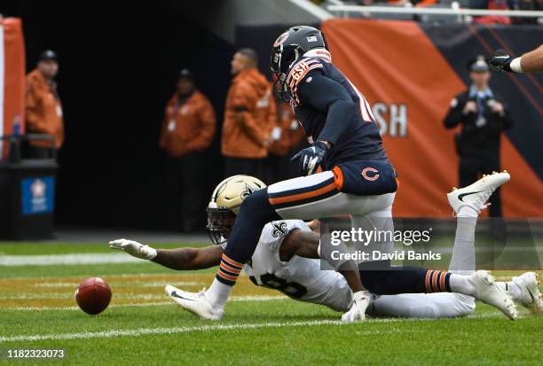 Gray of the New Orleans Saints and Pat O'Donnell of the Chicago Bears go for the ball in end zone that resulted in a safety against the Chicago Bears...