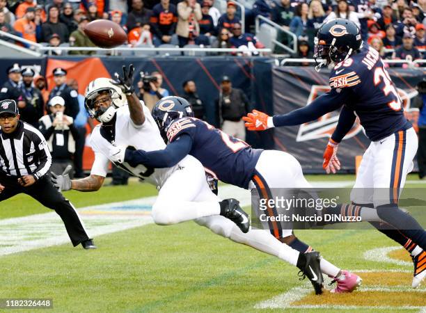 Ted Ginn of the New Orleans Saints is unable to make a catch in the end zone while pressured by Prince Amukamara of the Chicago Bears during the...