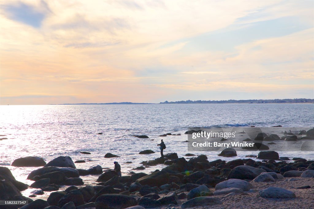Man fishing at Misquamicut, Westerly