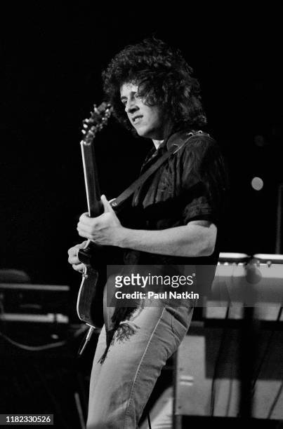 American Rock and Pop musician Steve Lukather, of the group Toto, plays guitar as he performs onstage at the Park West, Chicago, Illinois, August 2,...