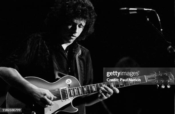American Rock and Pop musician Steve Lukather, of the group Toto, plays guitar as he performs onstage at the Park West, Chicago, Illinois, August 2,...