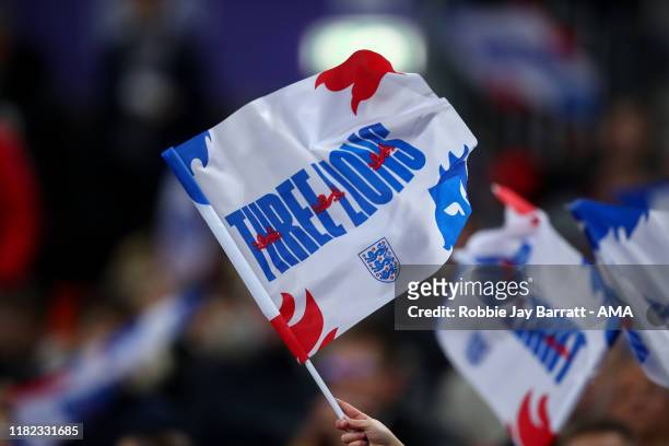 Fan waving a flag of England Three Lions during the UEFA Euro 2020 qualifier between England and Montenegro at Wembley Stadium on November 14, 2019...