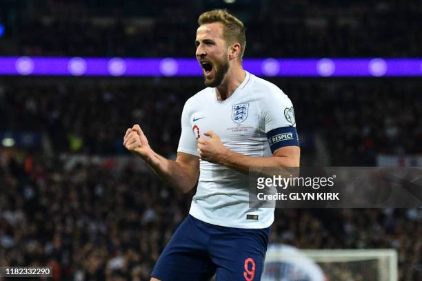 England's striker Harry Kane celebrates after scoring their second goal during the UEFA Euro 2020 qualifying first round Group A football match...