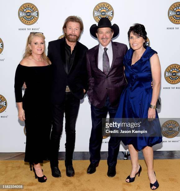Janine Dunn, Ronnie Dunn and Kix Brooks of Brooks & Dunn and Barbara Brooks attend the 2019 Country Music Hall of Fame Medallion Ceremony at Country...
