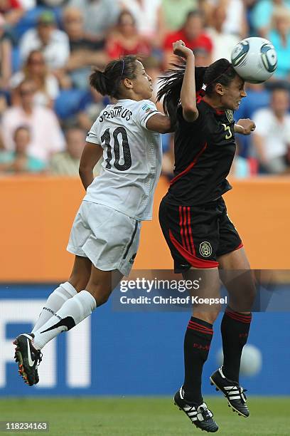 Sarah Gregorius of New Zealand and Rubi Sandoval of Mexico go up for a header during the FIFA Women's World Cup 2011 Group B match between New...